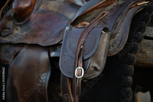 Western ranch saddle with saddle bags. 