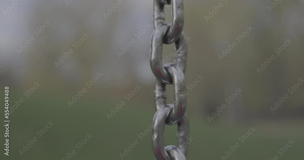 Chain close up detail with the sky in the background 4K F-LOG2 video format Chain close up detail with the sky in the background 4K F-LOG2 video format