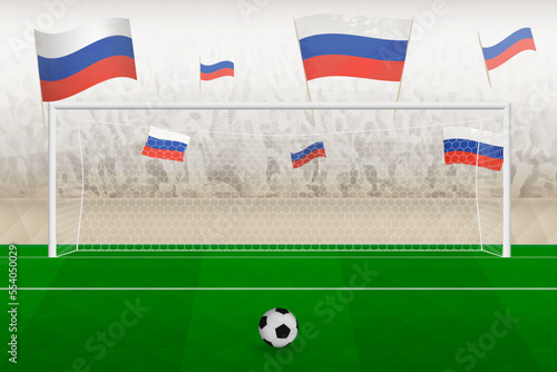 Russia football team fans with flags of Russia cheering on stadium, penalty kick concept in a soccer match.