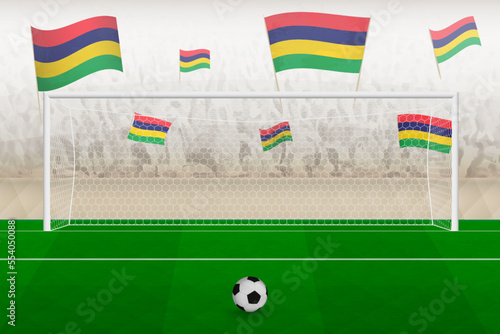 Mauritius football team fans with flags of Mauritius cheering on stadium, penalty kick concept in a soccer match.