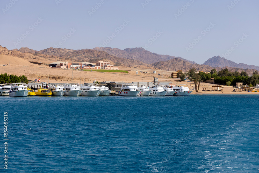 View of dive boats moored in the port, Dahab, Egypt
