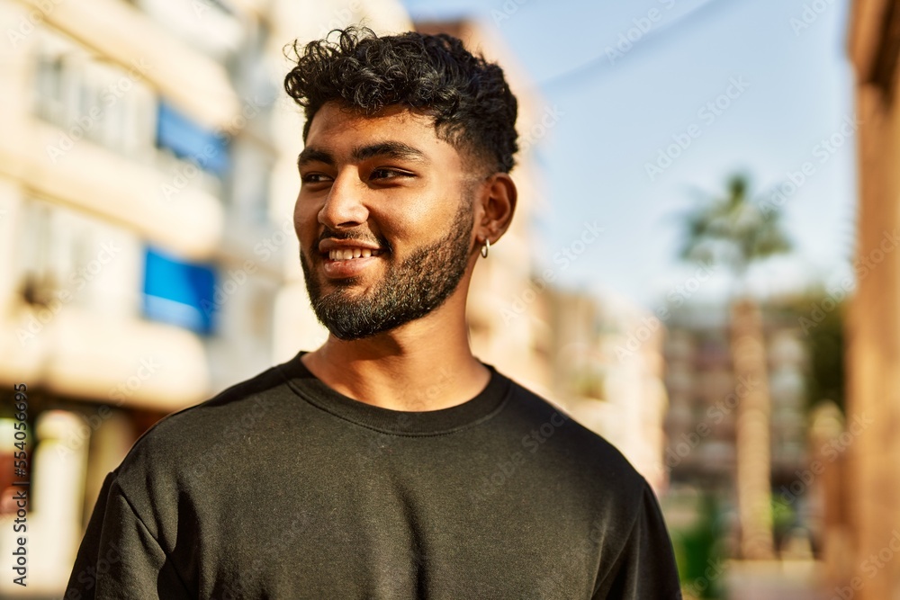 Young arab man smiling confident at street Young arab man smiling confident at street