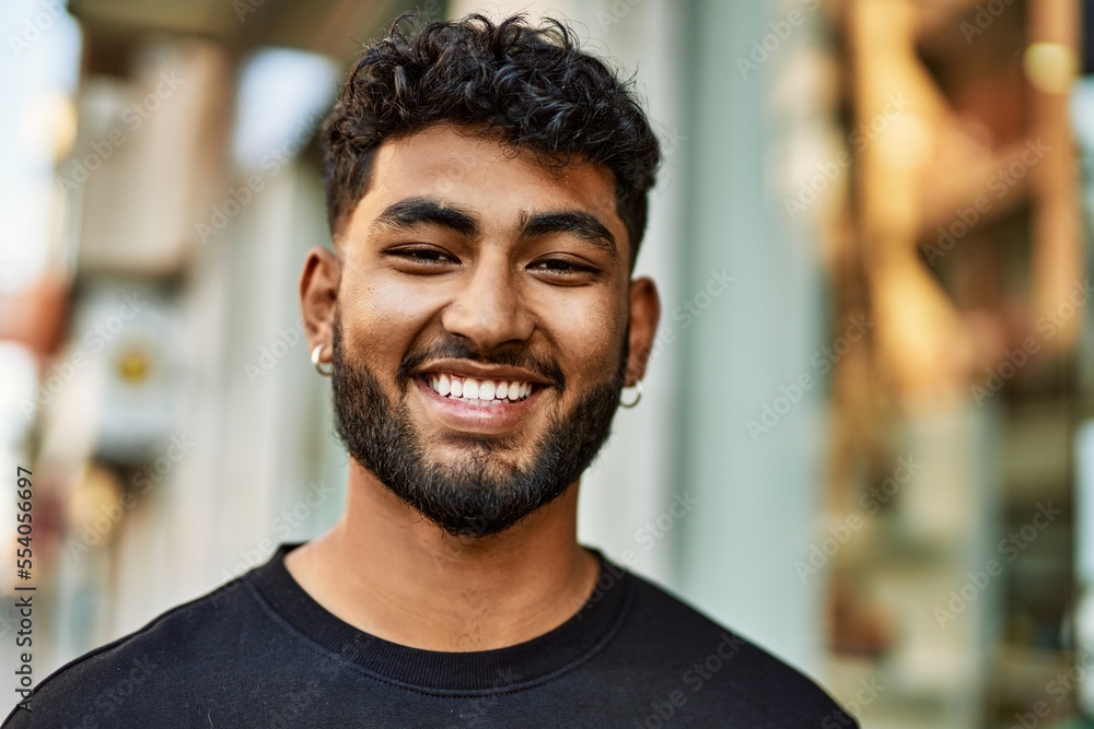 Young arab man smiling confident at street Young arab man smiling confident at street