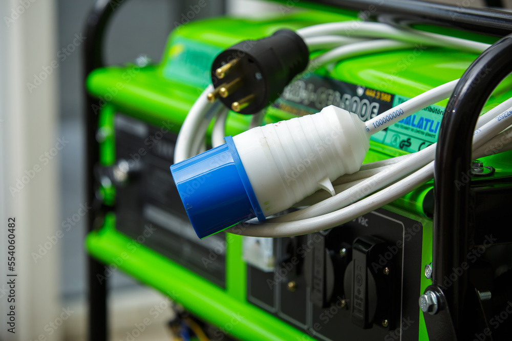 Electric plug with wires on the generator. Special electrical plugs for