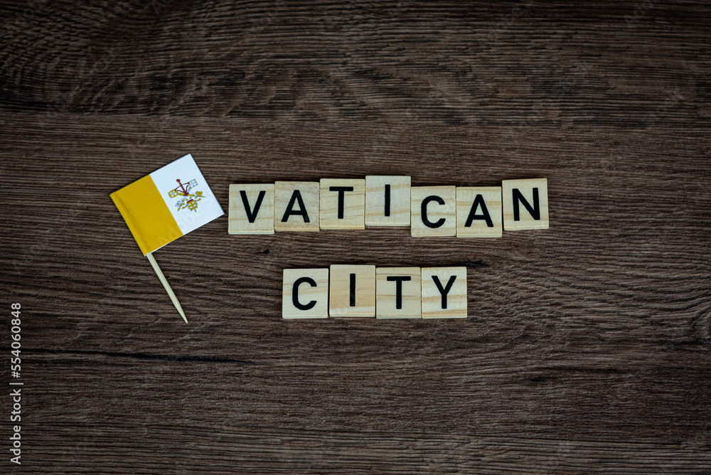 Vatican City - wooden word with vatican flag (wooden letters, wooden sign) Vatican City - wooden word with vatican flag (wooden letters, wooden sign)