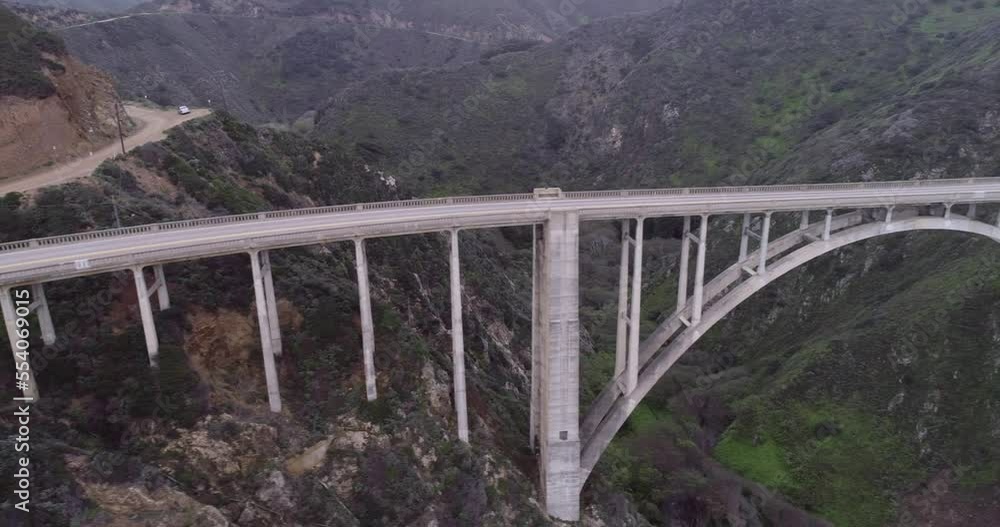 Bixby Creek Bridge also known as Bixby Canyon Bridge, on the Big Sur coast of California, is one of the most photographed bridges in California. Drone. USA Bixby Creek Bridge also known as Bixby Canyon Bridge, on the Big Sur coast of California, is one of the most photographed bridges in California. Drone. USA