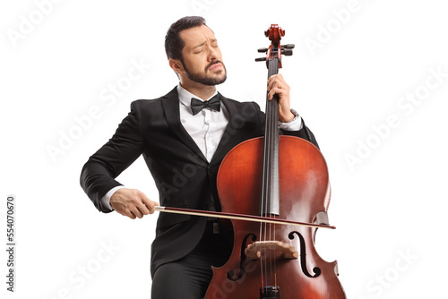 Male musician in a black suit and bow-tie performing with a cello