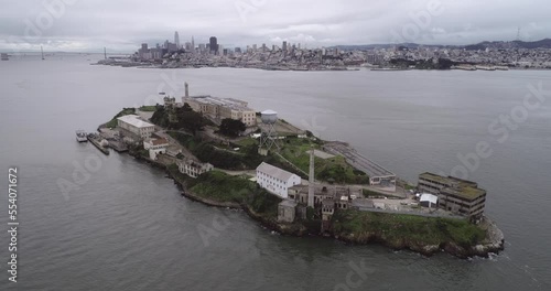 Aerial view of Alcatraz island in the San Francisco Bay. USA. The most famous Alcatraz Prison, Jail. Sightseeing Place. San Francisco City in Background