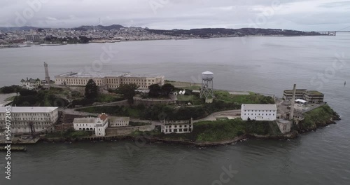 Aerial view of Alcatraz island in the San Francisco Bay. USA. The most famous Alcatraz Prison, Jail. Sightseeing Place. Golden Gate Bridge In Background