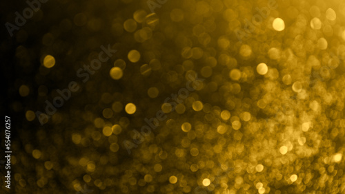 Abstract web banner background of blurred yellow glitter for design. Lights bokeh dis focus. Christmas background, copy space