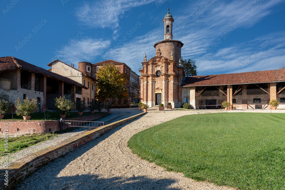 Marene, Cuneo, Piedmont, Italy - November 24, 2022: La Salza hamlet with Salsa chapel (18th century) Madonna del Carmine and San Biagio and the Salsa castle (13th century) and historic farmhouses