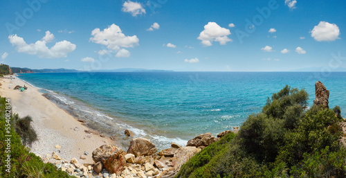 Summer sea top view with Maori Beach (Gomati, Halkidiki, Greece). People are unrecognizable. photo