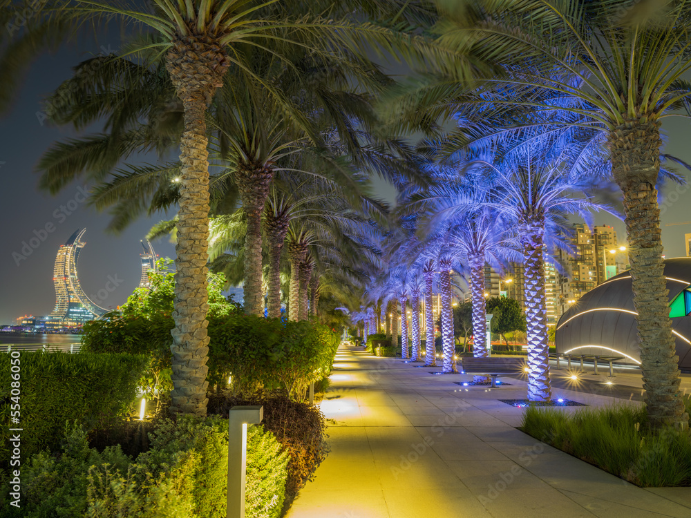 Lusail beachfront park lit up at night in Doha, Qatar
