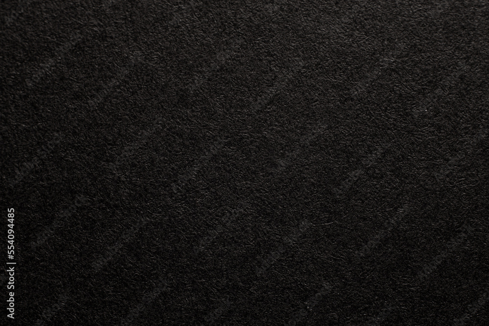 Black paper texture background. Black blank page. Background for your text. Macro photo. Black paper texture background. Black blank page. Background for your text. Macro photo.