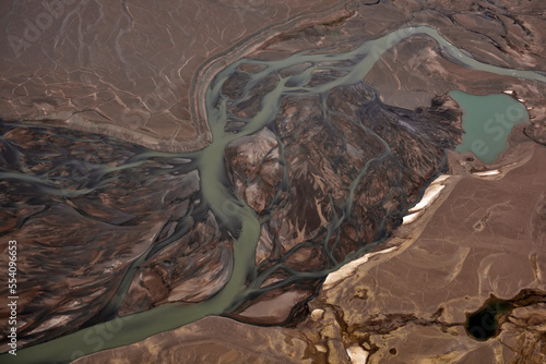 Greenland is often associated with scenes of ice and snow, however in the far north eastern reaches of the country the landscape can be very dry apart from the milky blue rivers that drain the small l