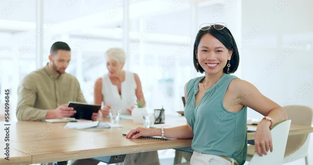 Portrait, happy or woman in a meeting planning a branding, advertising or marketing strategy with business people. Partnership, face or Japanese worker smiles with pride after a successful project Portrait, happy or woman in a meeting planning a branding, advertising or marketing strategy with business people. Partnership, face or Japanese worker smiles with pride after a successful project