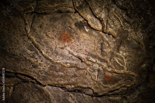 Red patches on the ceiling in the Terminal Hall, Ignatievskaya  cave, Ural Mountains; Russia photo