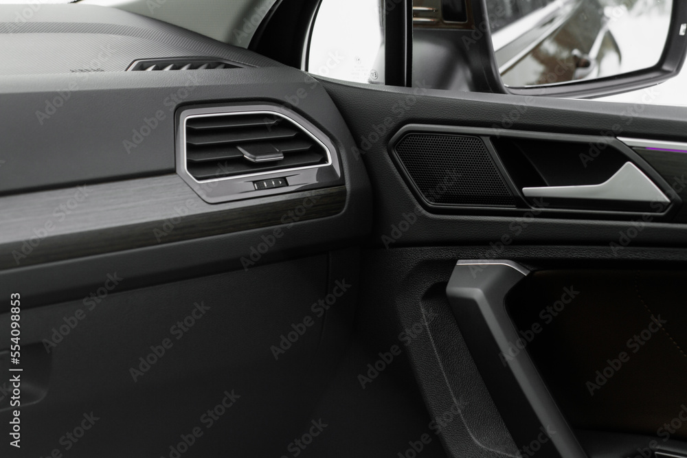  Modern car leather interior details with stitch. Car interior details.