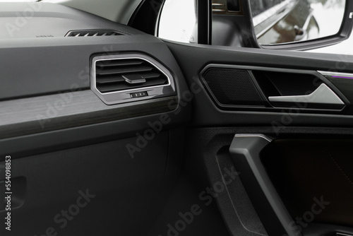  Modern car leather interior details with stitch. Car interior details.