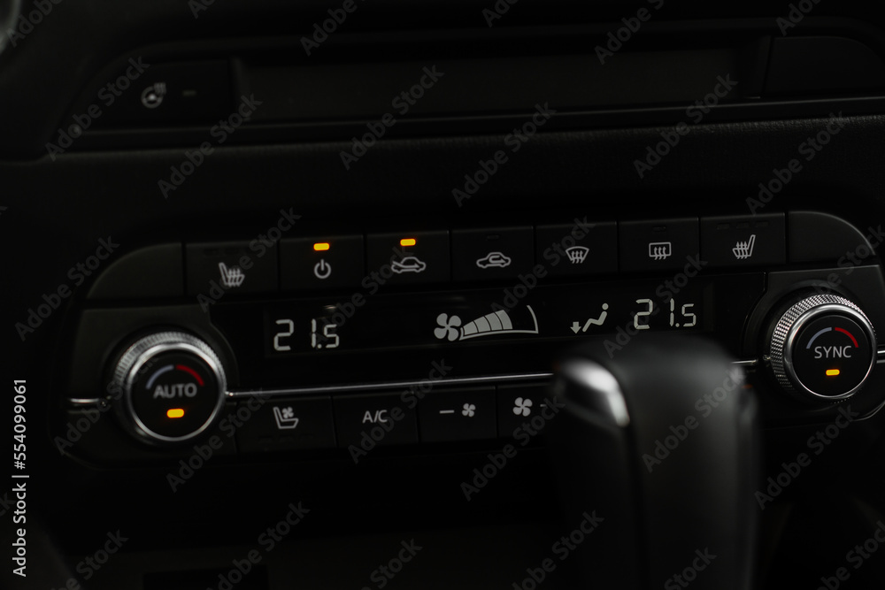 Car air conditioner dashboard. Modern car interior. Adjustable air conditioner. Car air conditioning system. Car air conditioner dashboard. Modern car interior. Adjustable air conditioner. Car air conditioning system.