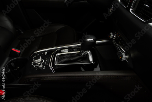 Modern automatic gearbox. Close up of the gearbox transmission handle. Automatic gear stick. © Roman