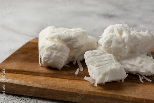 bala de coco or brazilian coconut candy, a gourmet homemade sweet dessert made of coconut.