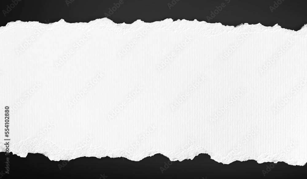 White paper torn piece on black background. Dirty wrinkled glued paper poster texture