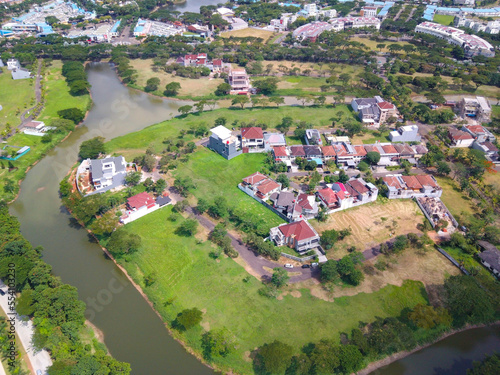 Aerial view from the drone above the Luxury real estate named as Balidwipa around the river at citra raya, tangerang