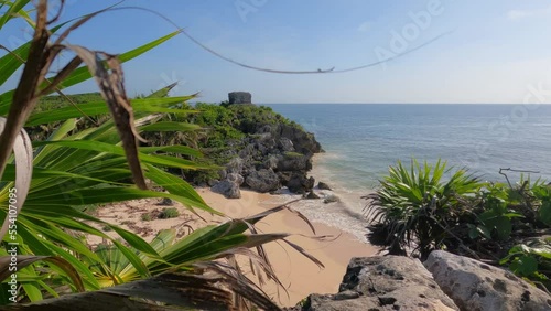 The beautiful Caribbean coast with the purest water in the archaeological zone of Tulum, Mexico. Slow motion footage.