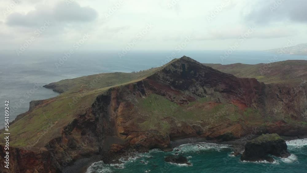 Majestic flight with a drone over the colorful coasts of Madeira in Portugal past a viewpoint called Ponta de São Lourenço. Majestic flight with a drone over the colorful coasts of Madeira in Portugal past a viewpoint called Ponta de São Lourenço.