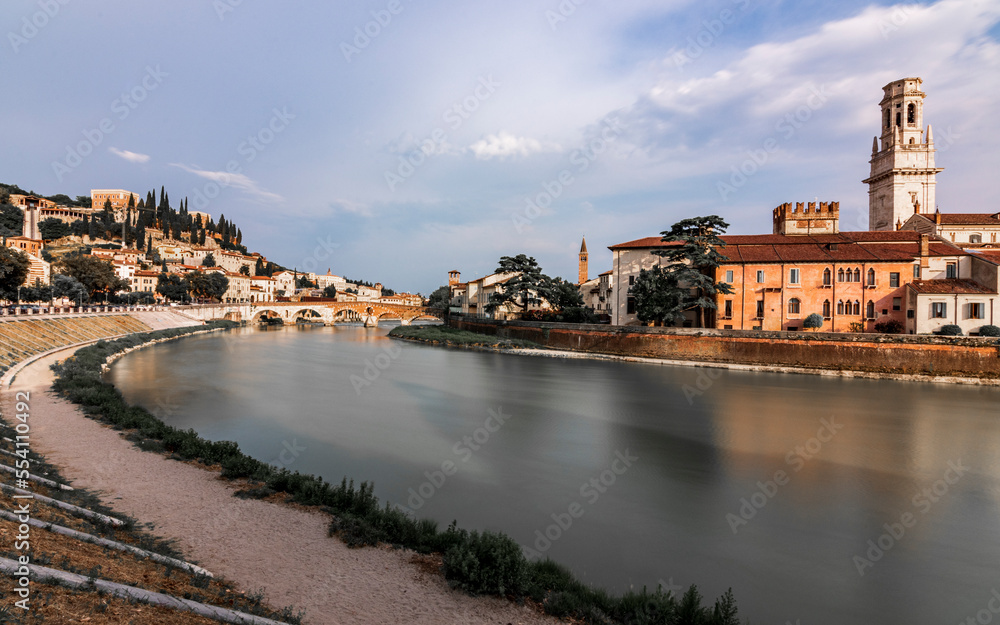 View of the town of Verona with long exposure and photo taken from the adige towards the city. Italy