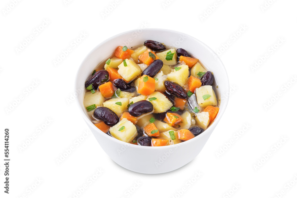 Kidney beans potato carrot vegan soup in a bowl on a white isolated background Kidney beans potato carrot vegan soup in a bowl on a white isolated background