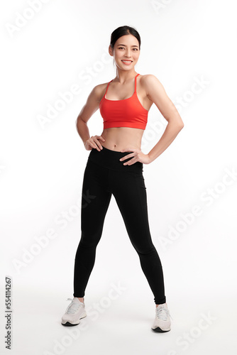 Beautiful fitness woman smiling on white background, Advertising sportswear and yoga wear. Healthy lifestyle, sport, Attractive young fit sports woman.