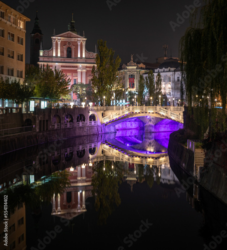 Famous three bridges at the Preseren square in the center of Ljubljana illuminated at night
