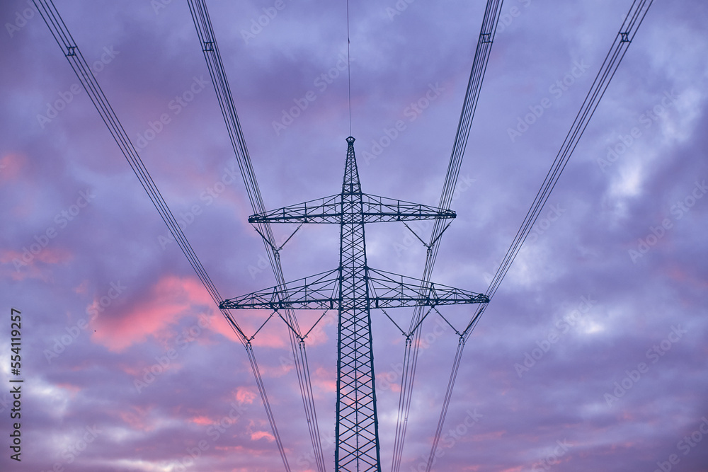 Power line against colorful evening sky. High quality photo Power line against colorful evening sky. High quality photo