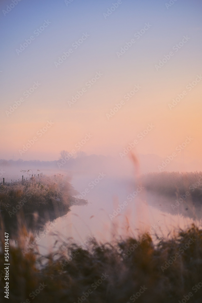 Pinnau river in morning dust. High quality photo Pinnau river in morning dust. High quality photo