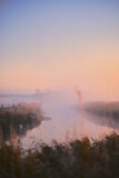 Pinnau river in morning dust. High quality photo
