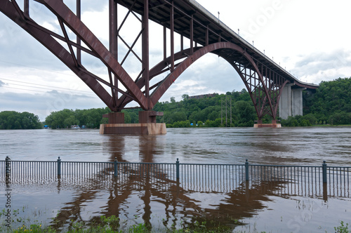flooded mississippi river and smith avenue bridge in saint paul minnesota