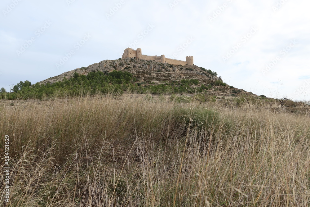 Castalla, Alicante, Spain, December 15. 2022: Castalla Castle on top of the mountain, Alicante. Spain