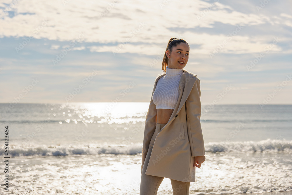Portrait of a young pretty girl on the background of the sea Portrait of a young pretty girl on the background of the sea