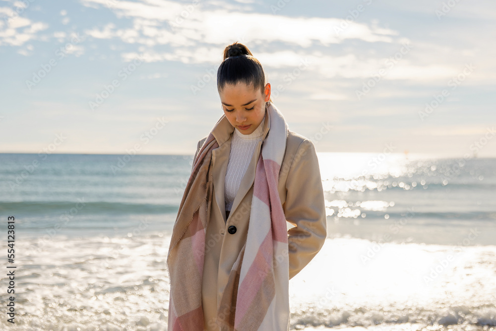 Portrait of a young pretty girl on the background of the sea Portrait of a young pretty girl on the background of the sea
