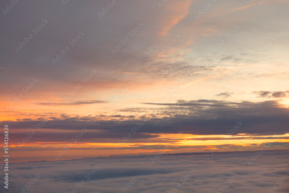 Awesome view of twilight . Dusk over the clouds