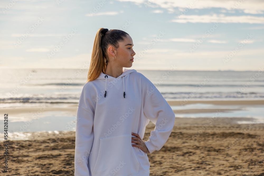 Portrait of a young pretty girl on the background of the sea Portrait of a young pretty girl on the background of the sea