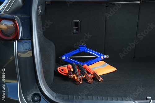 Wallpaper Mural Scissor jack, life vest and battery jumper cables in trunk. Car safety equipment Torontodigital.ca