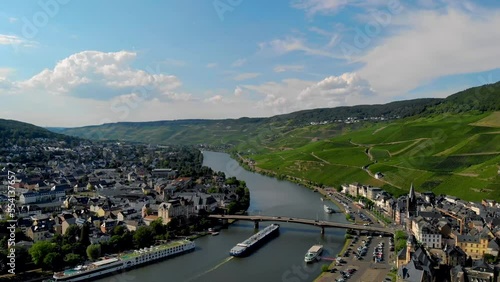 Inland shipping boat gas transport over the river Mosel in Germany on a bright summer day in the mountains of Bernkastel photo