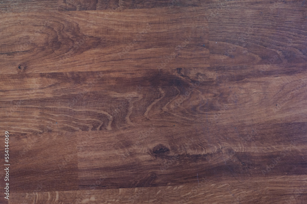 Dark brown wood grain patterned flooring Dark brown wood grain patterned flooring