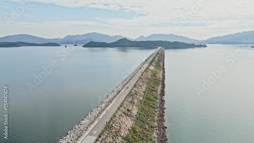 Plover Cove Reservoir in Tai Po Tai Mei Tuk, Hong Kong, aerial dam view, 2nd Largest Reservoir and Biking Spot for Tourism photo