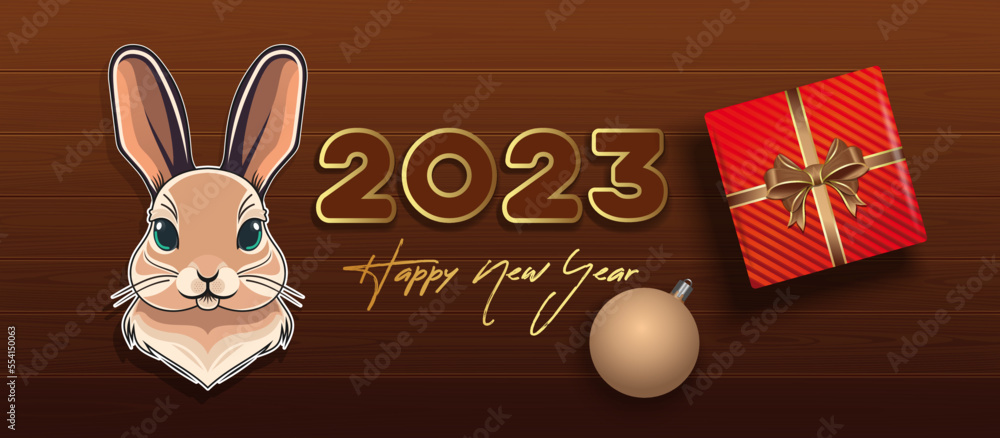 2023 Happy New Year. Horizontal vector banner with cute rabbit, Christmas gift box, Christmas tree toy on a wooden table, top view