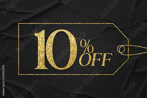 10 percent off gold glitter text with black paper texture background banner. Discount offer or sale tag for 10 percent off