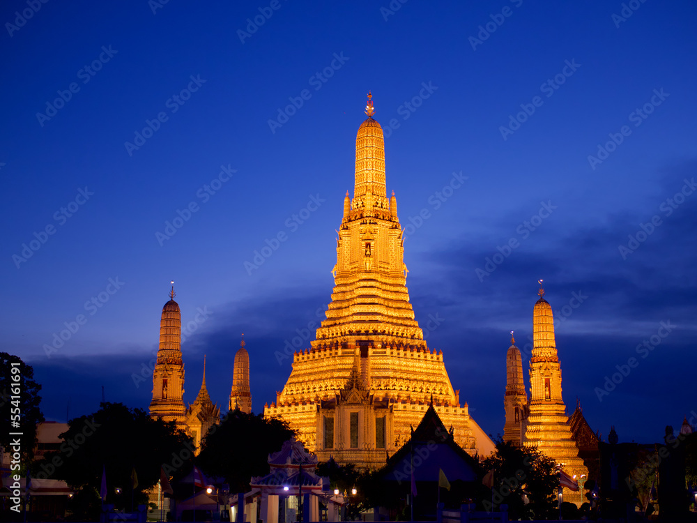 Golden stupa at night in Thailand